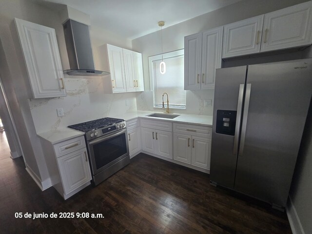 5544 S California Ave, Chicago, IL 60629 - kitchen featuring appliances with stainless steel finishes, wall chimney range hood, a sink, and decorative backsplash