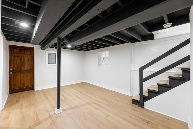 5544 S California Ave, Chicago, IL 60629 - finished below grade area featuring electric panel, wood finished floors, and baseboards