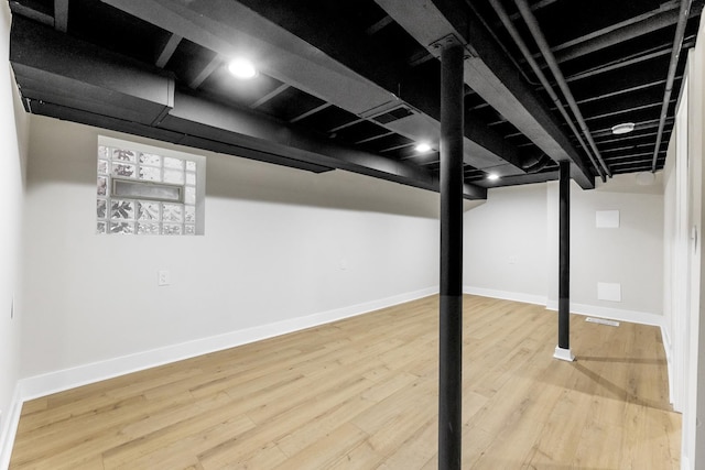 5544 S California Ave, Chicago, IL 60629 - finished basement featuring baseboards and wood finished floors