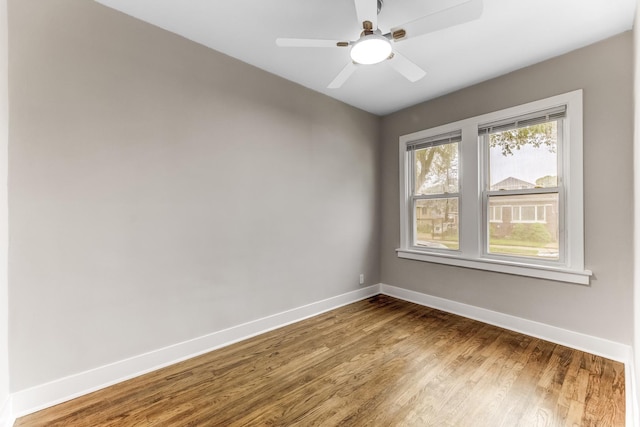 5544 S California Ave, Chicago, IL 60629 - empty room featuring baseboards, wood finished floors, and ceiling fan