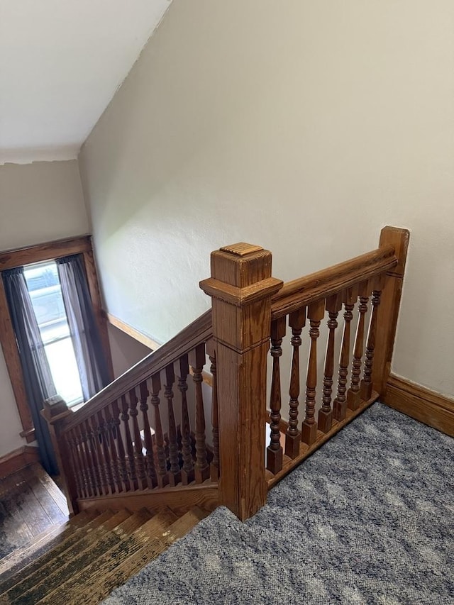 26 Elm Pl, Princeton, IL 61356 - stairs with baseboards and wood finished floors