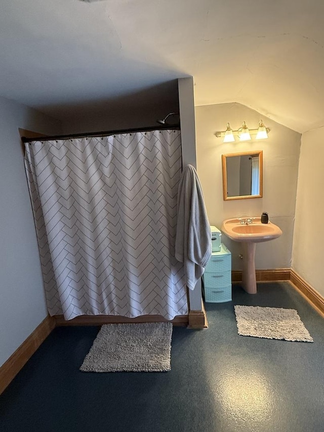 26 Elm Pl, Princeton, IL 61356 - bathroom with vaulted ceiling and baseboards