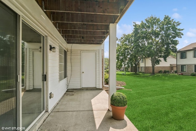 1727 W Hawkes St Unit 7, Arlington Heights, IL 60004 - view of exterior entry with a lawn and a patio