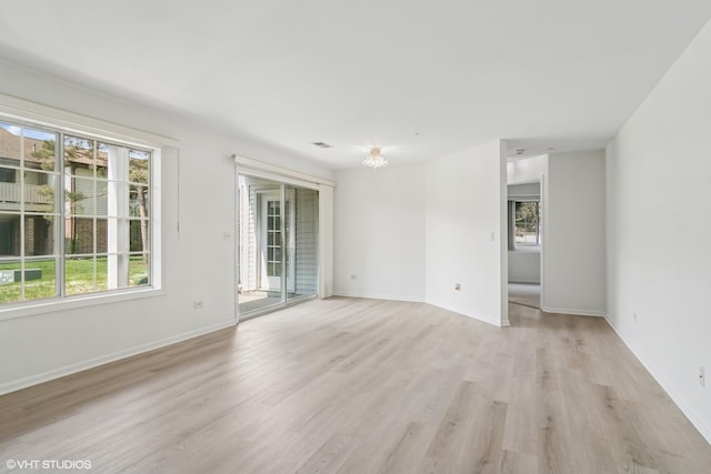 1727 W Hawkes St Unit 7, Arlington Heights, IL 60004 - unfurnished room with light wood finished floors and baseboards
