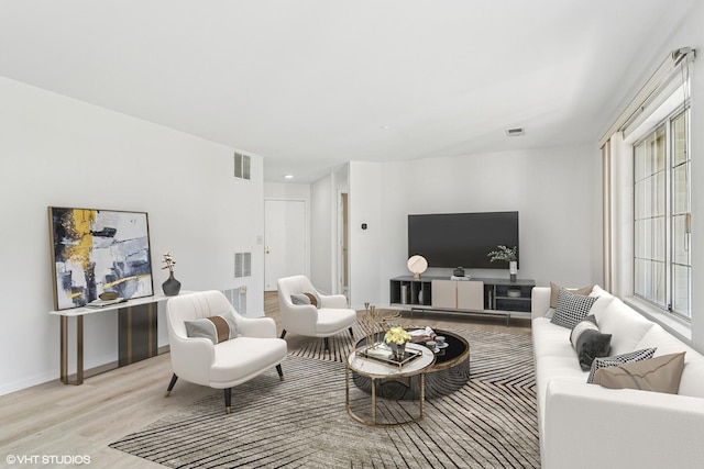 1727 W Hawkes St Unit 7, Arlington Heights, IL 60004 - living area featuring light wood-type flooring and baseboards