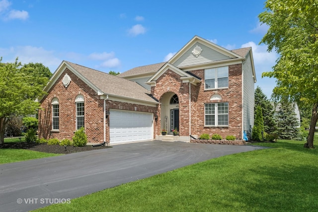 4370 Whitehall Ln, Algonquin, IL 60102 - traditional-style house featuring driveway, an attached garage, a front yard, and brick siding