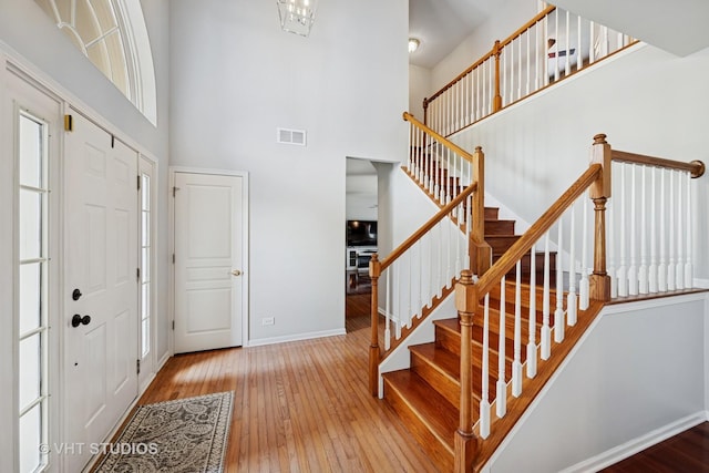 4370 Whitehall Ln, Algonquin, IL 60102 - entryway featuring a high ceiling, hardwood / wood-style flooring, and stairway