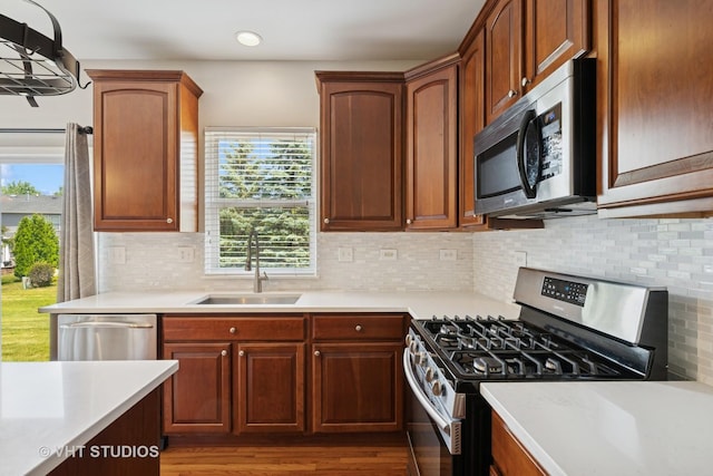4370 Whitehall Ln, Algonquin, IL 60102 - kitchen featuring stainless steel appliances, plenty of natural light, light countertops, decorative backsplash, and recessed lighting