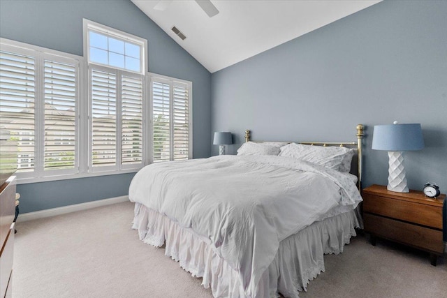365 Lake Ave Unit D, Wauconda, IL 60084 - carpeted bedroom featuring lofted ceiling, multiple windows, baseboards, and a ceiling fan