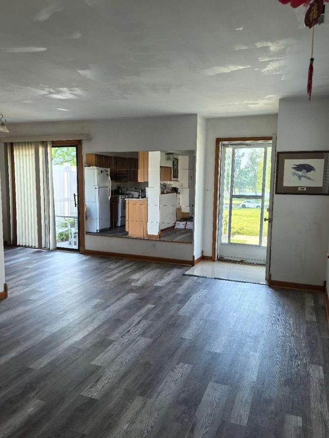 1483 Cornell Ct, Hoffman Estates, IL 60169 - unfurnished living room with plenty of natural light and dark wood-style floors