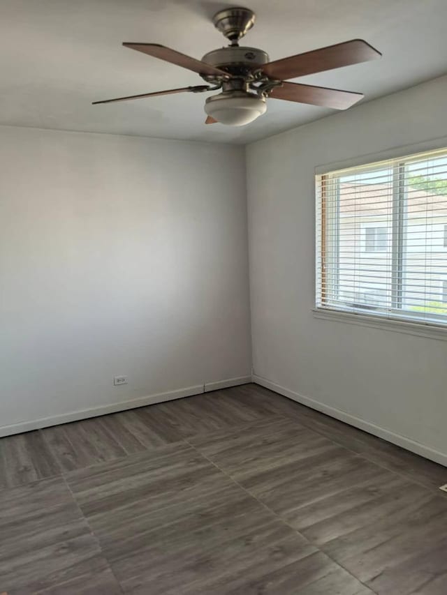 1483 Cornell Ct, Hoffman Estates, IL 60169 - spare room featuring a ceiling fan and baseboards