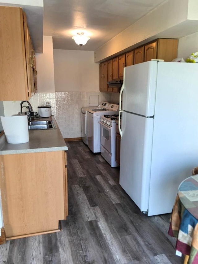 1483 Cornell Ct, Hoffman Estates, IL 60169 - kitchen featuring white appliances, washer / dryer, dark wood-type flooring, under cabinet range hood, and brown cabinetry