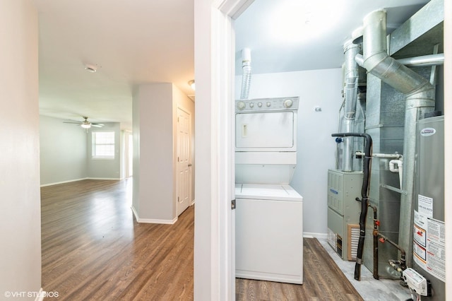527 E Shagbark Ln Unit H, Streamwood, IL 60107 - washroom with stacked washer / dryer, water heater, wood finished floors, and ceiling fan