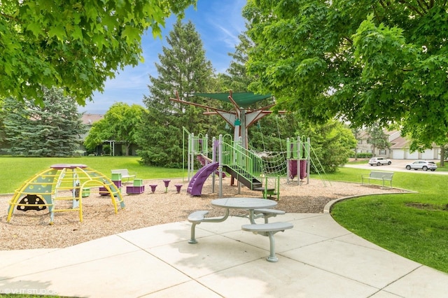 527 E Shagbark Ln Unit H, Streamwood, IL 60107 - community playground featuring a lawn