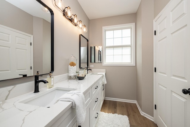26615 W Captiva Ln, Plainfield, IL 60544 - full bath with double vanity, wood finished floors, and baseboards