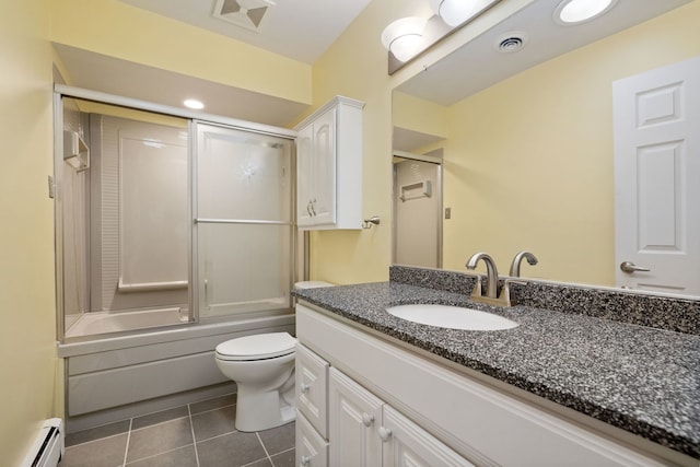 13116 Woodland Dr, Homer Glen, IL 60491 - bathroom with a baseboard radiator, vanity, tile patterned floors, and bath / shower combo with glass door