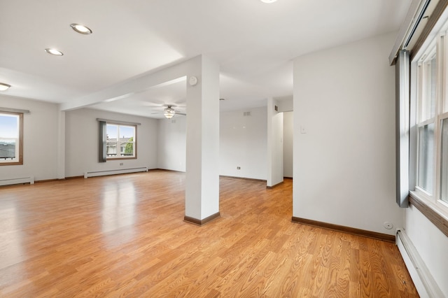 13116 Woodland Dr, Homer Glen, IL 60491 - empty room with baseboard heating, light wood-type flooring, recessed lighting, and ceiling fan