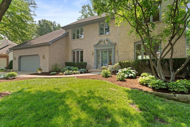 2731 Wolf River Ct, Naperville, IL 60565 - colonial inspired home with brick siding, a front lawn, and an attached garage