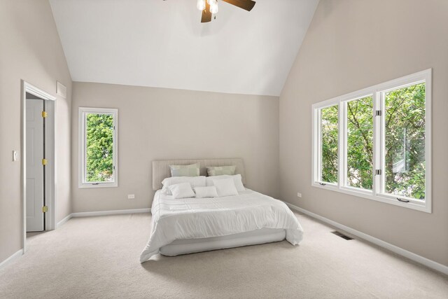 2731 Wolf River Ct, Naperville, IL 60565 - carpeted bedroom featuring vaulted ceiling, multiple windows, baseboards, and a ceiling fan