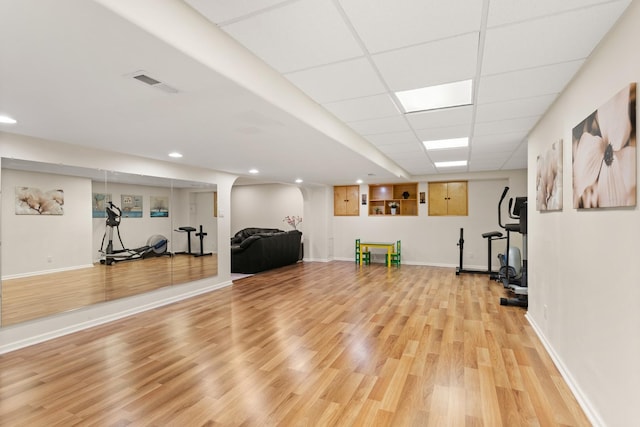 2731 Wolf River Ct, Naperville, IL 60565 - workout area with light wood-style flooring, baseboards, recessed lighting, and a paneled ceiling