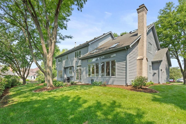 2731 Wolf River Ct, Naperville, IL 60565 - rear view of property featuring a chimney, a lawn, and a shingled roof