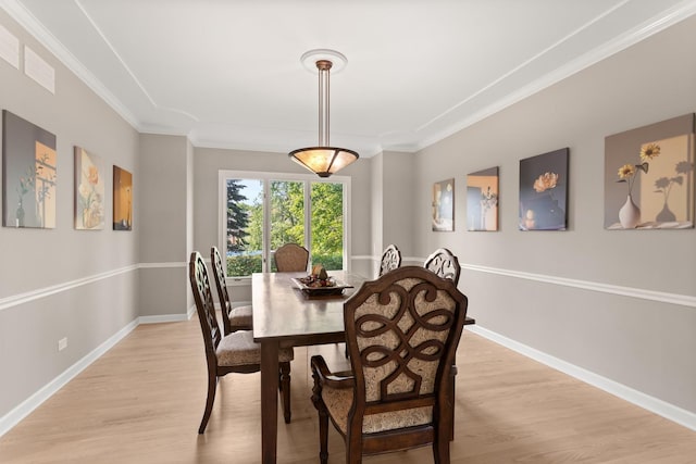 2731 Wolf River Ct, Naperville, IL 60565 - dining space with ornamental molding, light wood finished floors, and baseboards