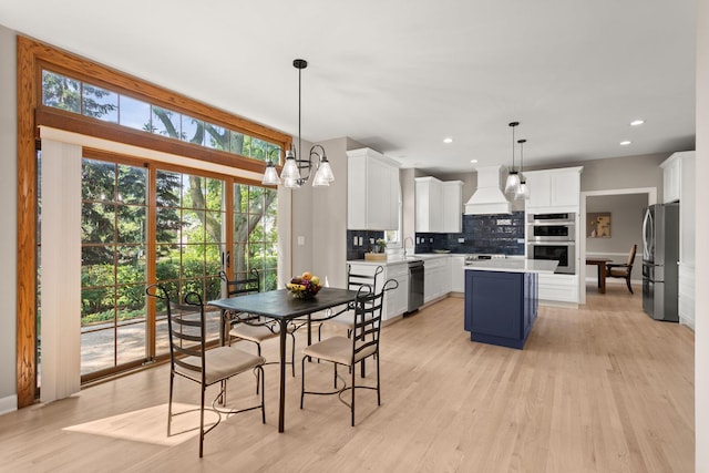 2731 Wolf River Ct, Naperville, IL 60565 - dining room with light wood-style floors, recessed lighting, and baseboards