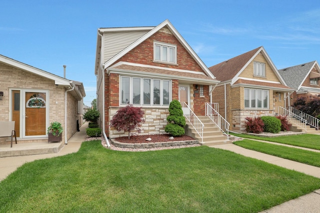 5531 S Mcvicker Ave, Chicago, IL 60638 - view of front of house with a front yard, brick siding, and stone siding