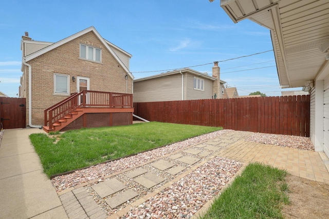 5531 S Mcvicker Ave, Chicago, IL 60638 - rear view of property featuring brick siding, a deck, a patio, a chimney, and stairs