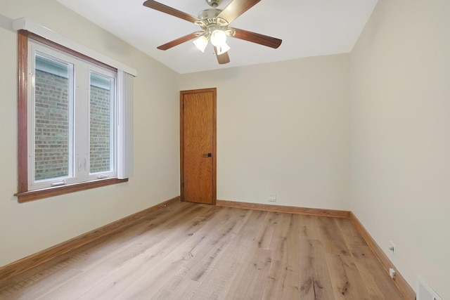 5531 S Mcvicker Ave, Chicago, IL 60638 - unfurnished room with light wood finished floors, ceiling fan, and baseboards