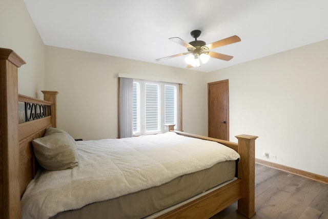5531 S Mcvicker Ave, Chicago, IL 60638 - bedroom featuring wood finished floors, baseboards, and ceiling fan