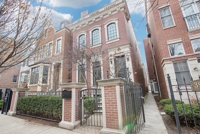 3926 N Greenview Ave, Chicago, IL 60613 - view of front of house featuring a gate and brick siding