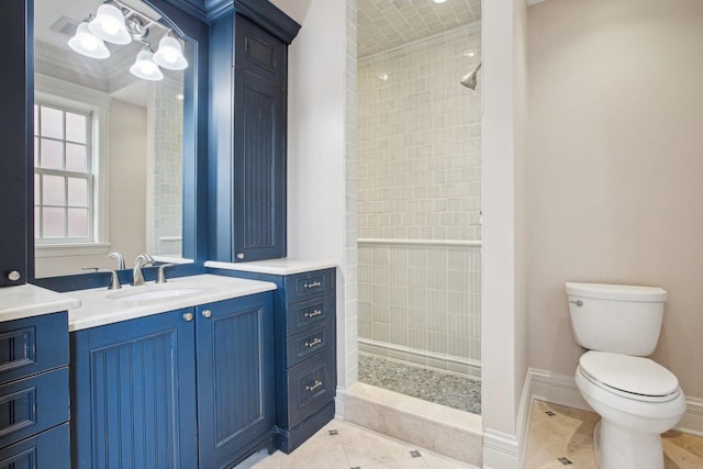 3926 N Greenview Ave, Chicago, IL 60613 - bathroom with vanity, tiled shower, toilet, tile patterned flooring, and baseboards