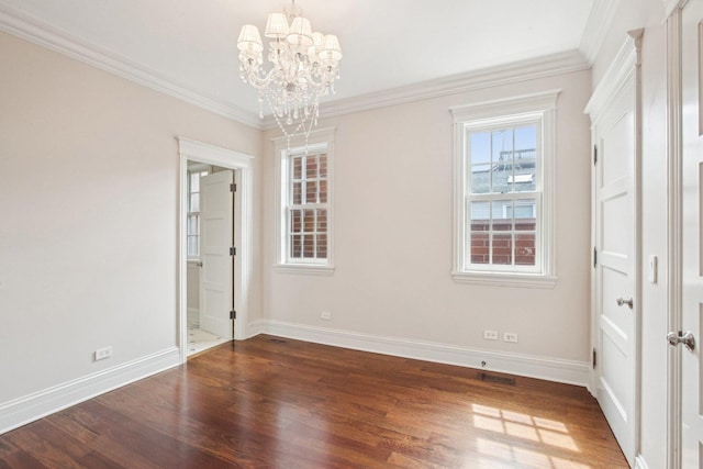 3926 N Greenview Ave, Chicago, IL 60613 - unfurnished bedroom featuring a chandelier, baseboards, wood finished floors, crown molding, and ensuite bathroom