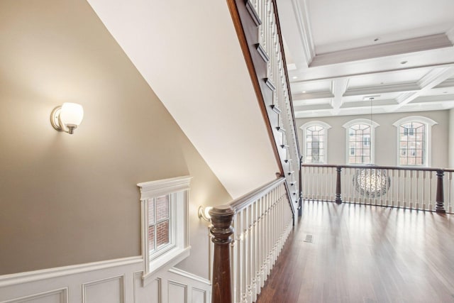 3926 N Greenview Ave, Chicago, IL 60613 - hall with beamed ceiling, coffered ceiling, wood finished floors, a wainscoted wall, and an upstairs landing