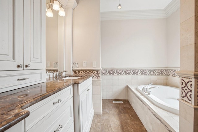 3926 N Greenview Ave, Chicago, IL 60613 - full bathroom featuring vanity, a bath, ornamental molding, and a wainscoted wall
