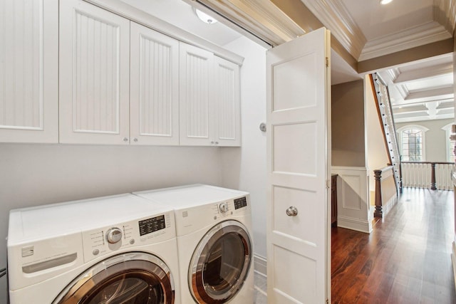 3926 N Greenview Ave, Chicago, IL 60613 - washroom featuring cabinet space, ornamental molding, washer and clothes dryer, dark wood-style flooring, and a wainscoted wall