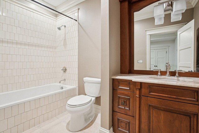 3926 N Greenview Ave, Chicago, IL 60613 - full bathroom featuring toilet, vanity, tiled shower / bath combo, tile patterned flooring, and crown molding