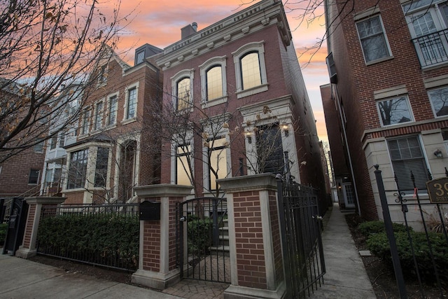 3926 N Greenview Ave, Chicago, IL 60613 - view of front facade featuring a gate and brick siding