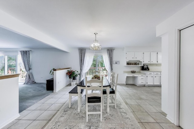 14828 W N Creek Ct, Homer Glen, IL 60491 - dining room featuring a chandelier and light tile patterned flooring
