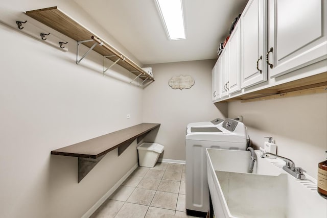14828 W N Creek Ct, Homer Glen, IL 60491 - laundry area featuring washing machine and clothes dryer, cabinet space, and light tile patterned floors