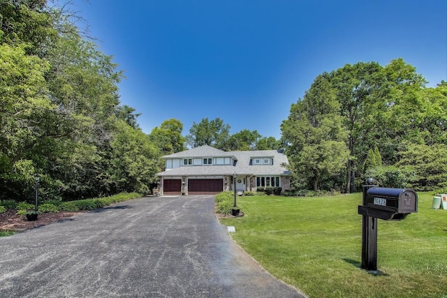 14828 W N Creek Ct, Homer Glen, IL 60491 - view of front of property with an attached garage, a front yard, and driveway