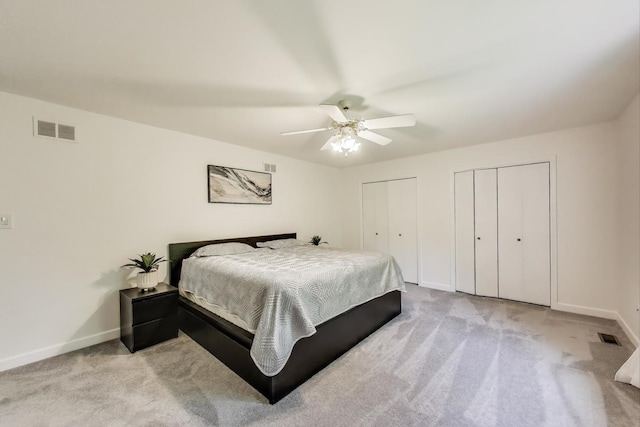 14828 W N Creek Ct, Homer Glen, IL 60491 - bedroom featuring multiple closets, carpet, and a ceiling fan