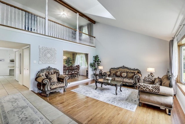 14828 W N Creek Ct, Homer Glen, IL 60491 - living area with high vaulted ceiling, light tile patterned flooring, and beamed ceiling