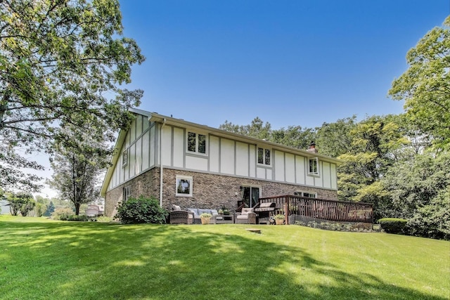 14828 W N Creek Ct, Homer Glen, IL 60491 - rear view of property with board and batten siding, an outdoor hangout area, a chimney, and a yard