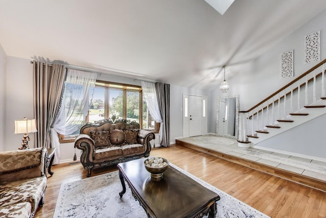 14828 W N Creek Ct, Homer Glen, IL 60491 - living room featuring wood finished floors, lofted ceiling, and stairway