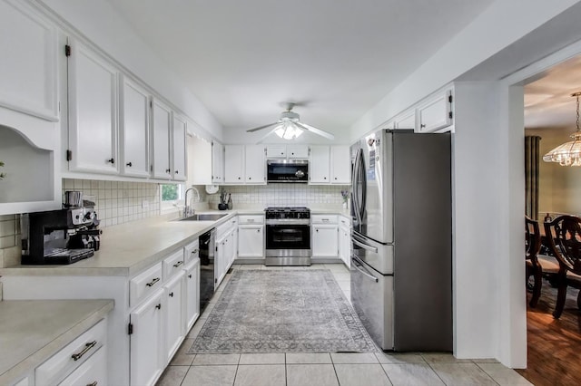 14828 W N Creek Ct, Homer Glen, IL 60491 - kitchen with stainless steel appliances, backsplash, light countertops, and white cabinets