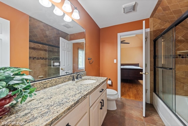 4332 Camelot Cir, Naperville, IL 60564 - bathroom featuring toilet, ensuite bathroom, vanity, and combined bath / shower with glass door