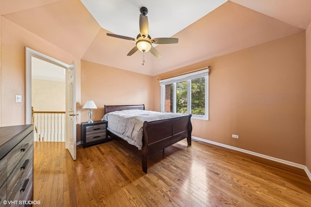 4332 Camelot Cir, Naperville, IL 60564 - bedroom with hardwood / wood-style flooring, vaulted ceiling, baseboards, and a ceiling fan