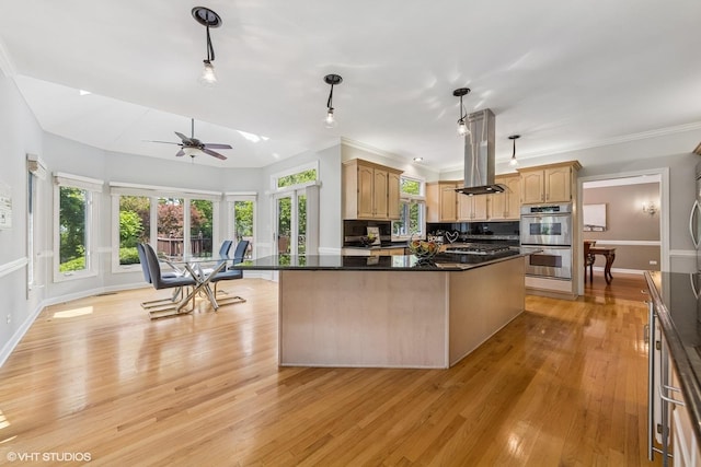 4332 Camelot Cir, Naperville, IL 60564 - kitchen with double oven, island exhaust hood, light wood-style flooring, ceiling fan, and dark countertops